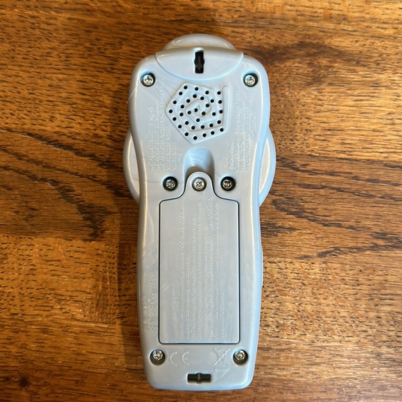 Multi-pack take along toys. Includes remote, phone and misc. book type toy. - Picture 11 of 11